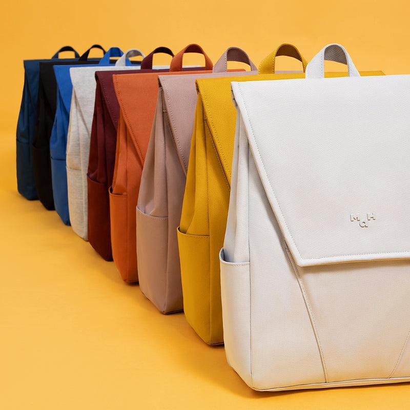 Stylish minimalist backpacks in multiple colors, perfect for everyday use and travel