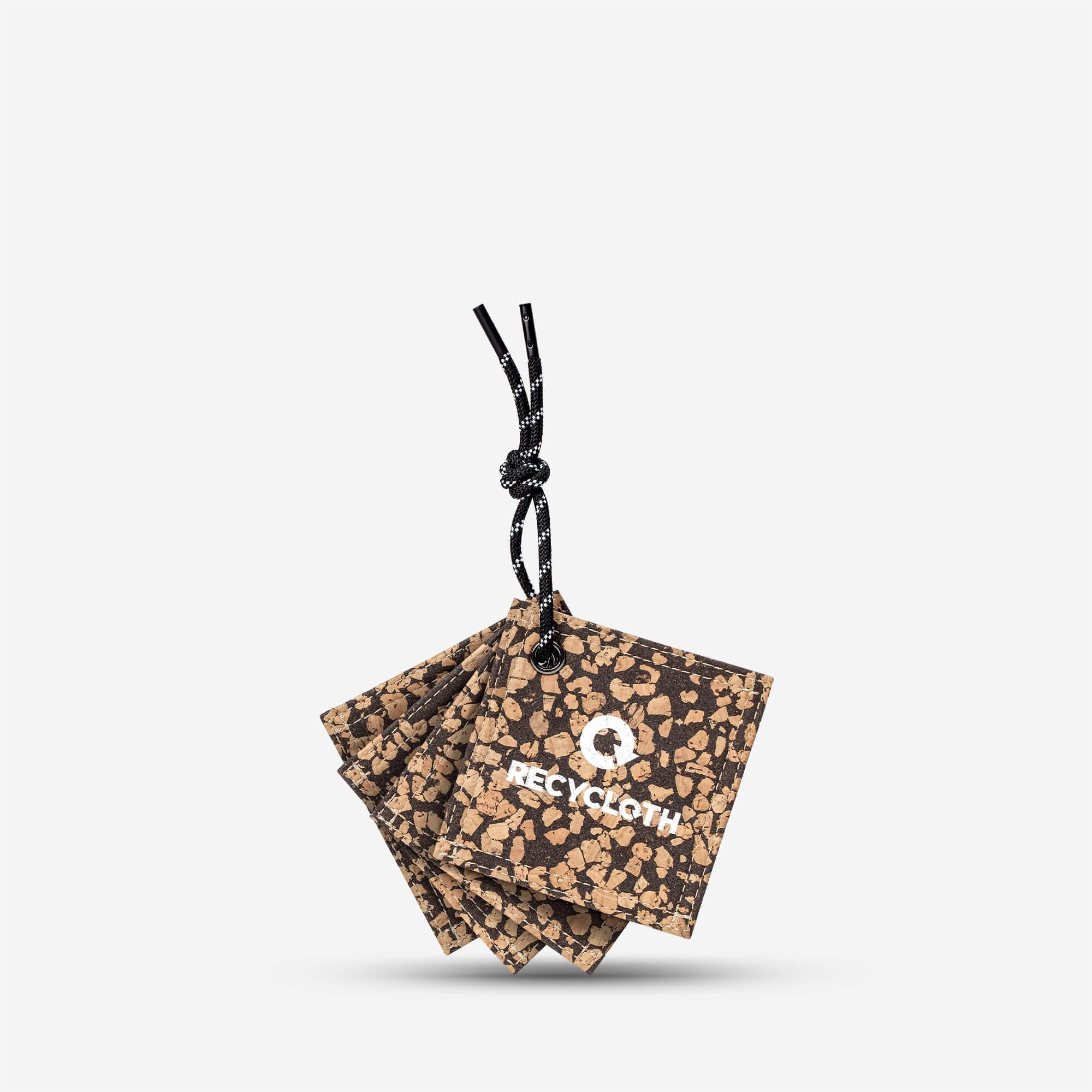 Cork-patterned Recycloth tags with black rope, eco-friendly accessory for bags and backpacks