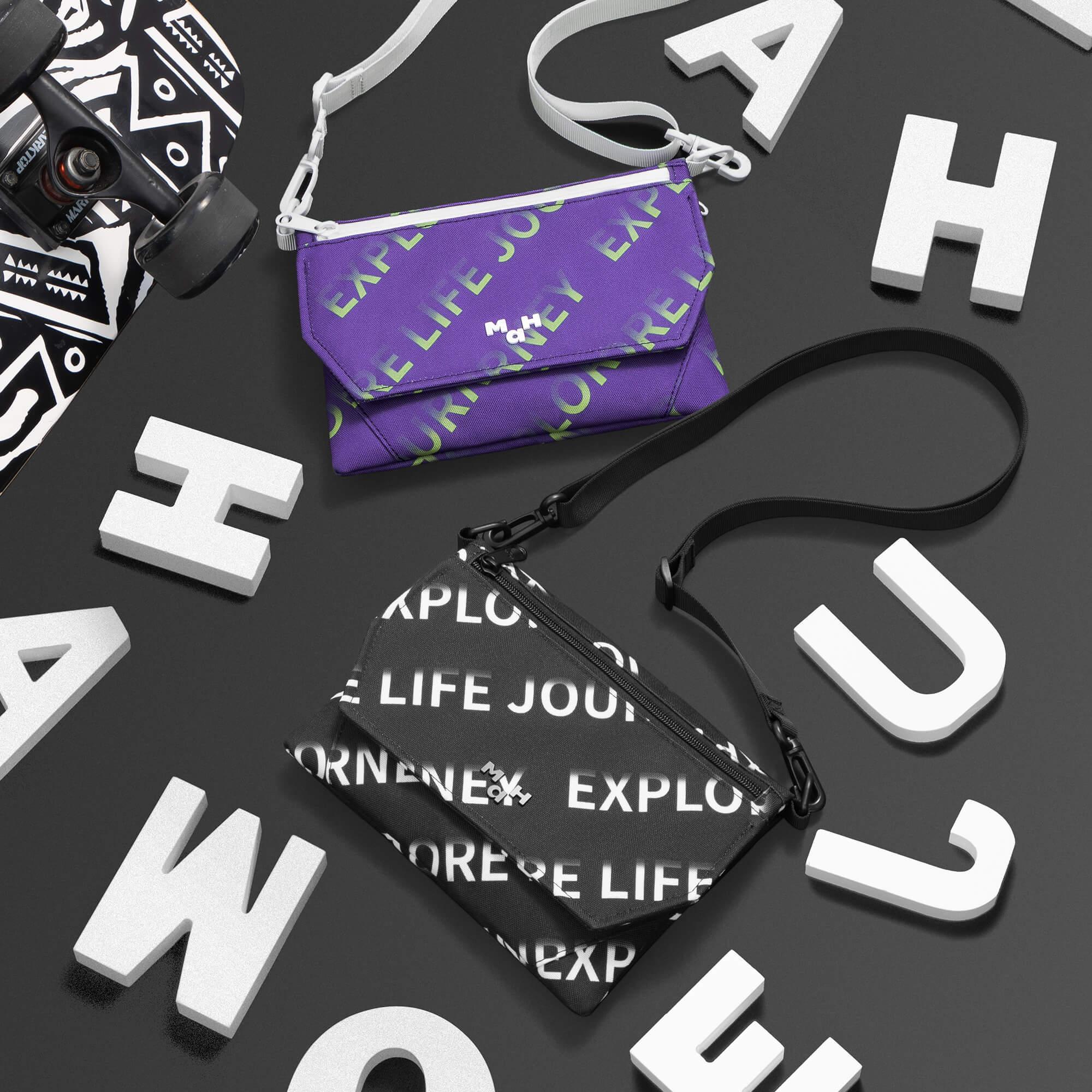 Purple and black crossbody bags with 'Explore Life Journey' print, styled with skateboard and letter blocks
