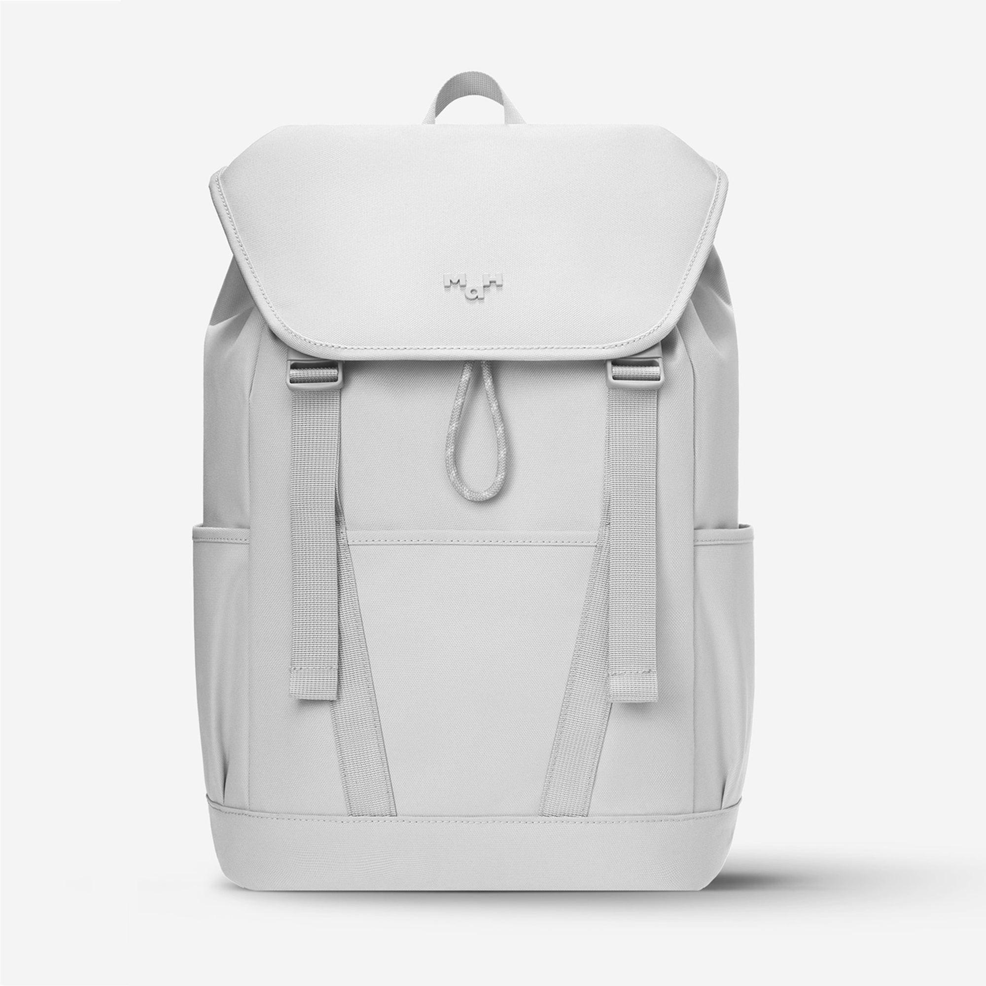 Minimalist white backpack with front flap, side pockets, and drawstring closure, ideal for daily use or travel.