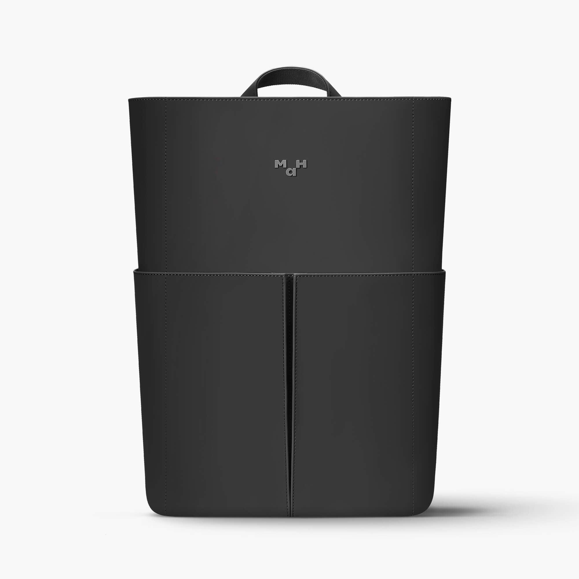 Black minimalist backpack with front pocket and top handle, sleek design for everyday use