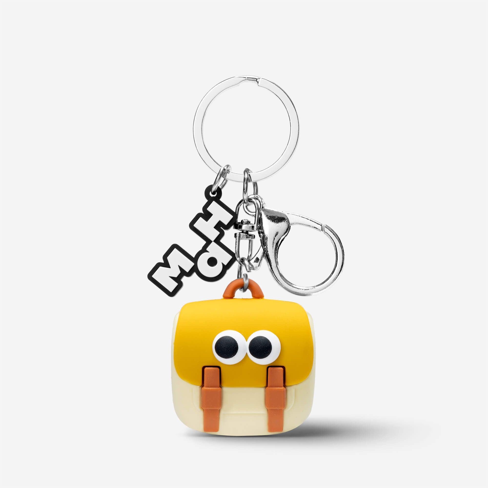 Cute yellow backpack keychain with googly eyes, orange straps, and metal ring for bags or keys