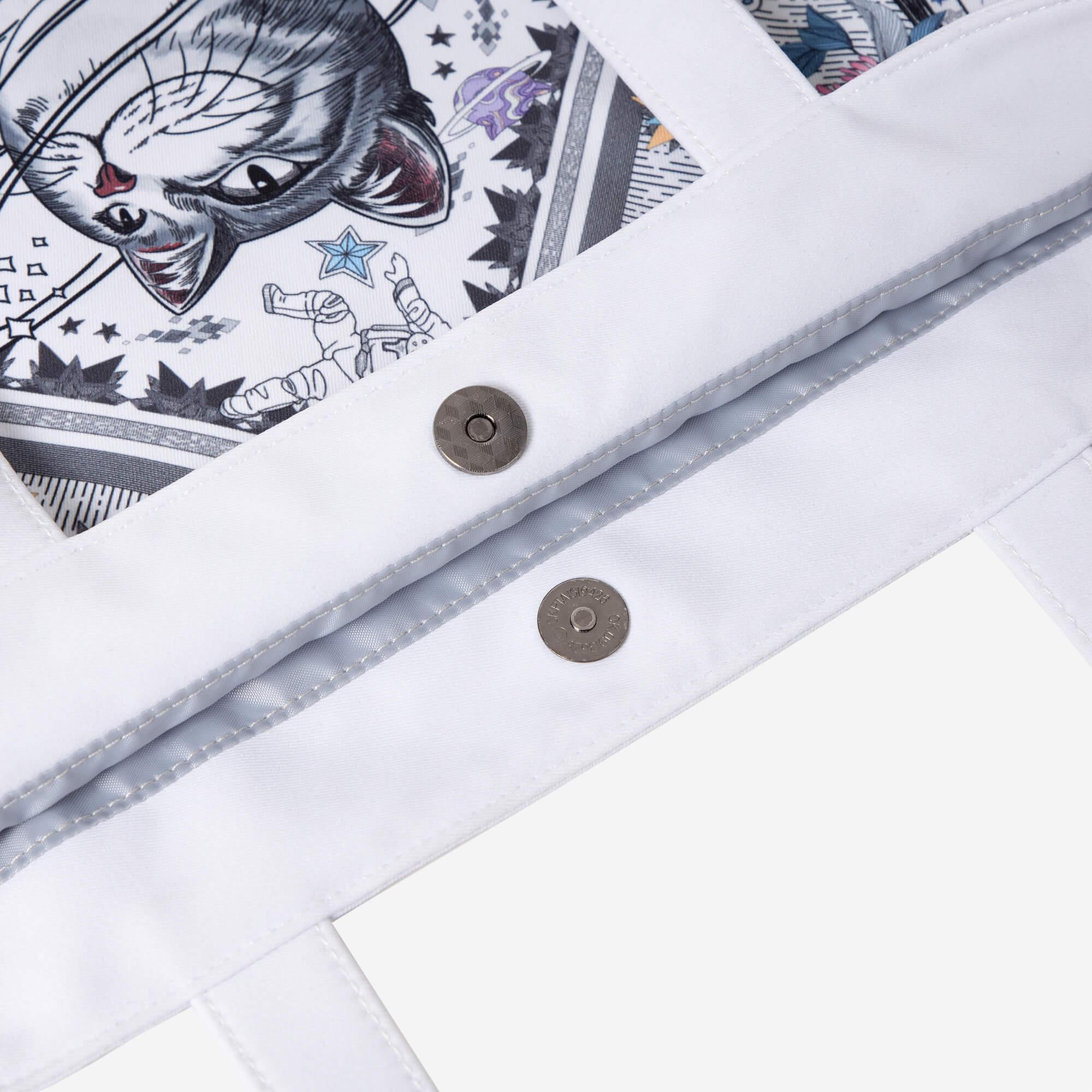 White tote bag with space cat print, astronaut design, and metal snap closures