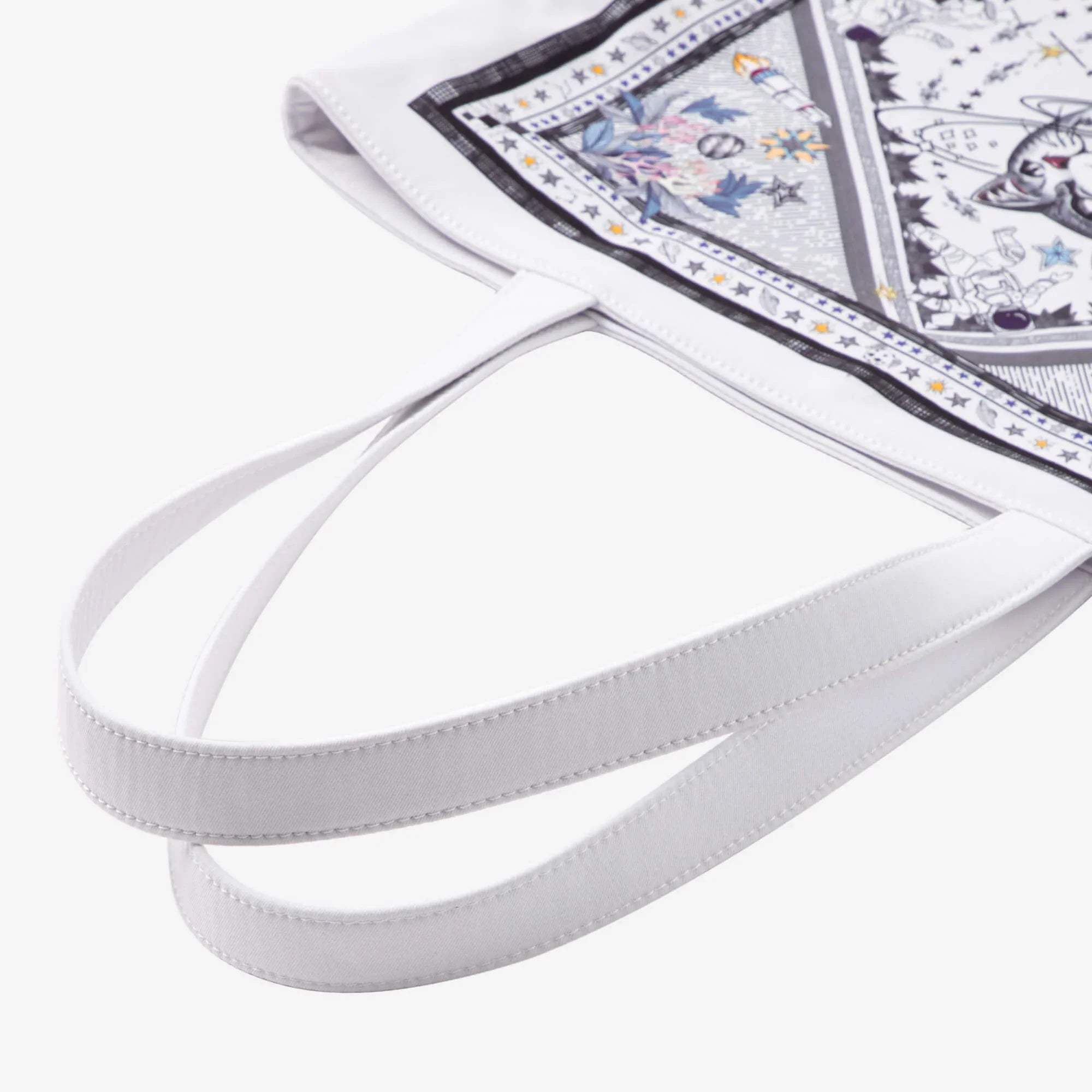White tote bag with cosmic cat and star pattern, stylish everyday accessory