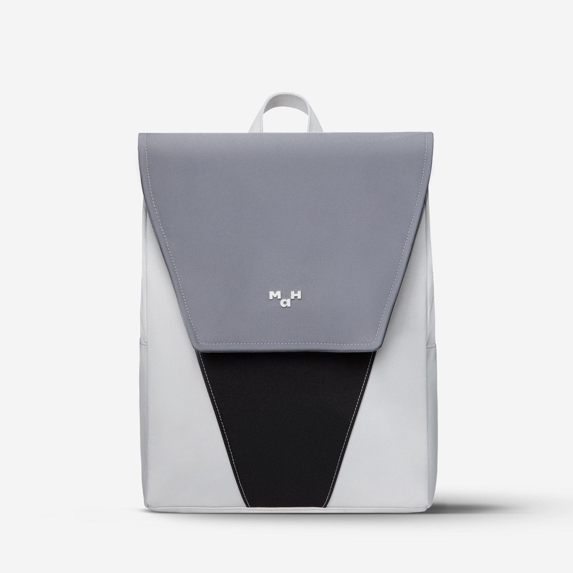 Modern gray and black geometric backpack with minimalist design and top handle