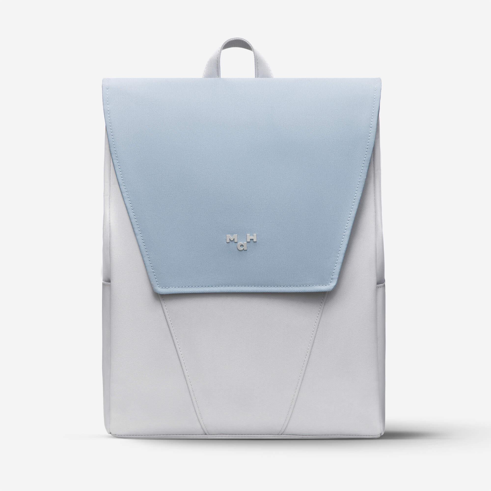 Light blue and gray minimalist backpack with front flap and subtle logo, ideal for everyday use.