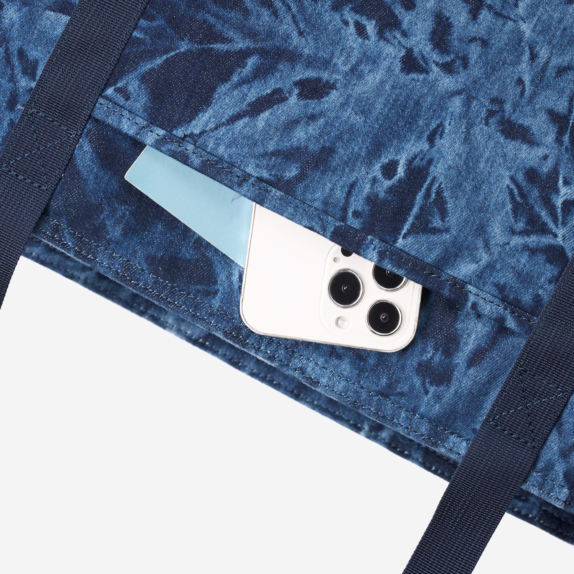 Blue tie-dye bag with phone and card pocket, stylish everyday carry accessory